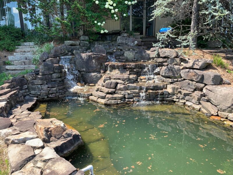 Custom stone water features, ponds, and fountains built by Atlanta Waterscapes profiled in The Master of Water project collection